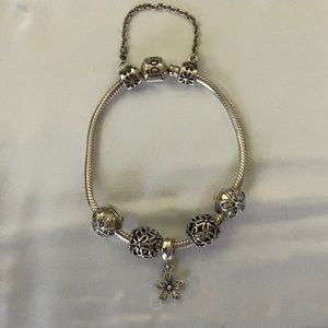 Pandora bracelet with daisy charms